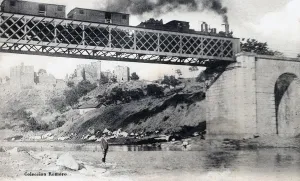 Railroad Prints: Train crossing the bridge over the Sil river passing through Ponferrada, postcard 1910s