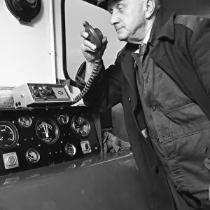 Control Panel Gallery: Train driver on an intercom, South Yorkshire, 1964. Artist: Michael Walters