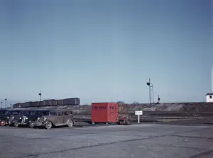Train going over the hump at C & NW RRs Proviso yard, Chicago, Ill. 1942. Creator: Jack Delano