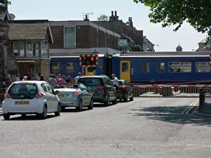 Train passing through level crossing in Lincoln 2014