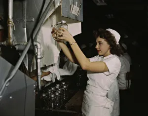 Transfusion donor bottles, Baxter Lab. Glenview, Ill. 1942. Creator: Howard Hollem
