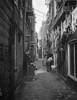 Clothes Line Prints: Travel views of Europe, between 1904 and 1938. Creator: Arnold Genthe