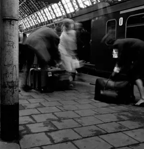Suitcase Prints: Travellers boarding a train to Rotterdam, Centraal Station, Amsterdam, Netherlands, 1963