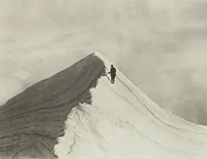 Traversing Annette wind ridge by chief guide F. Milne, Mt Cook district. From the album... 1920s. Creator: Harry Moult
