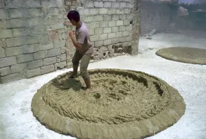 Treading Prints: Treading clay for pottery in Tunisia. Artist: CM Dixon