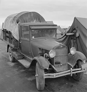 Truck, baby parked on front seat, Merrill, Klamath County, Oregon, 1939. Creator: Dorothea Lange