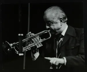 Trumpeter Kenny Baker playing at the Forum Theatre, Hatfield, Hertfordshire, 1978