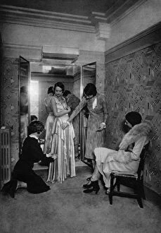 Dressmaking Gallery: Trying on a dress at a great dressmakers, Paris, 1931.Artist: Ernest Flammarion