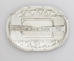 Tudric Cake Basket, about 1905. Creators: Archibald Knox, William Hair Haseler, Liberty and Company. Tudric Cake Basket, about 1905. Creators: Archibald Knox, William Hair Haseler, Liberty and Company
