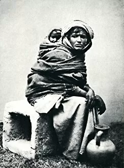 Tunisia Gallery: Tunisian (Berber) woman and child, 1912. Artist: J Garrigues