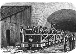 Mont Cenis Prints: Tunnel opening of the Alps, workers exiting after a working day by the French mouth