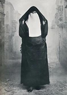 Hejab Prints: A Turkish lady in outdoor costume, 1912. Artist: Lekegian & Co