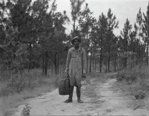 Turpentine Prints: Turpentine dipper near Waycross, Georgia, 1937. Creator: Dorothea Lange