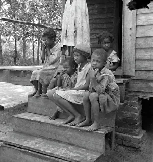 Living Conditions Prints: Turpentine worker's family near Cordele, Alabama, 1936. Creator: Dorothea Lange