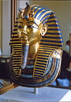 Egyptian Art Gallery: Tutankhamun death mask made of solid gold encrusted with precious stones, found by H