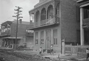 Balcony Rail Prints: Two-story house, New Orleans, between 1920 and 1926. Creator: Arnold Genthe
