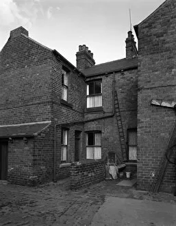 Backyard Gallery: Typical pit housing in Furlong Road, Bolton upon Dearne, South Yorkshire, 1963. Artist