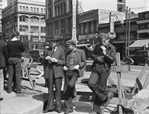 Cigarettes Gallery: Unemployed young men pause a moment... Salvation Army, San Francisco, California, 1939