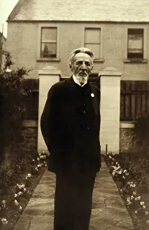 Skinny Prints: An unidentified man, standing in a garden, c1900. Creator: Unknown