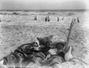 Social Life Prints: Unidentified man and two women at Long Beach