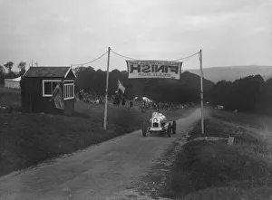 Unidentified offset single-seater car finishing the Shelsley Walsh Hillclimb, Worcestershire, 1935