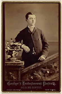 Unidentified well-dressed young man, standing, about 1880. Creator: Gardner