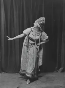 Arm Out Prints: Unidentified woman, possibly Miss Beatrice Wood, (1916?). Creator: Arnold Genthe