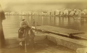 Young Girl Prints: Unidentified young girl standing on wharf