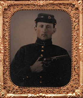 Revolver Prints: Union Soldier with Colt Revolver, in Studio, 1861-65. Creator: Unknown