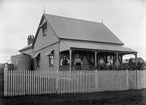 Verandah Prints: Unknown family portrait and family with monkey on verandah, c1900s