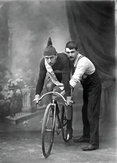 Lestrange Robert Augustus Henry Prints: Unknown man on a bicycle, studio portrait (Championship of Queensland sash/ribbon), 1905