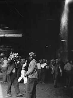 Banana Prints: Unloading bananas, New Orleans, between 1920 and 1926. Creator: Arnold Genthe
