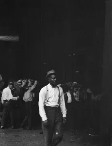 Unloading bananas, New Orleans, between 1920 and 1926. Creator: Arnold Genthe