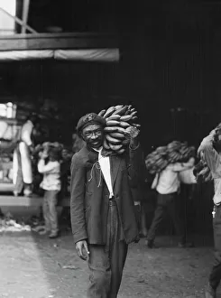 Banana Prints: Unloading bananas, New Orleans, between 1920 and 1926. Creator: Arnold Genthe