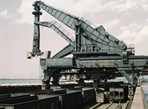 Wharf Gallery: Unloading a lake freighter at the Pennsylvania Railroad iron ore docks...Cleveland, Ohio, 1943