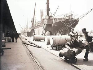 Roll Gallery: Unloading rolls of paper from a ship, London, c1905