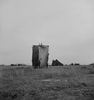 Refugee Camp Prints: Unsanitary privy in potato pickers camp near Shafter