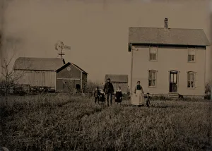 Ferrotype Prints: Untitled (A Man, a Woman, and Three Children Standing in Front of a Farmhouse), 1875