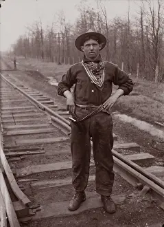 Railroad Prints: Untitled (man with pistol on railroad tracks)