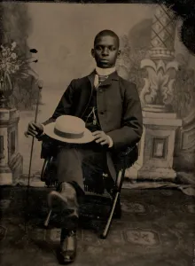 Surprise Prints: Untitled (Portait of a Seated Man Holding a Hat), 1875. Creator: Unknown