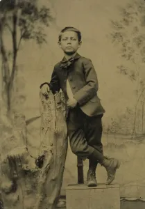 Ferrotype Prints: Untitled (Portrait of Boy Leaning), 1850 / 99. Creator: Unknown