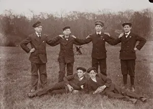 Caps Prints: Untitled (six boys and boy with bicycle in background)