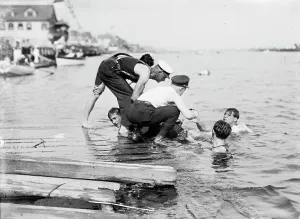 Showing Prints: Untying Otto after 45 yd. swim - hands and feet tied, (1910?). Creator: Bain News Service