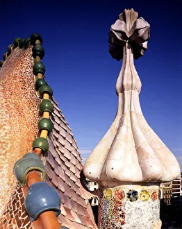 Antoni Gallery: Upper finishing of the facade of Batllo House with a pinnacle finished in a four-armed cross