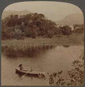 Kerry Prints: On the Upper Lake of pretty Killarney, Ireland, 1901. Creator: Underwood & Underwood