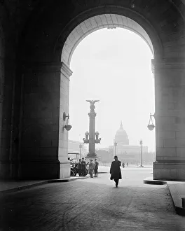 U.S. Capitol - View Through Arch At Union Station, 1917. Creator: Harris & Ewing. U.S. Capitol - View Through Arch At Union Station, 1917. Creator: Harris & Ewing