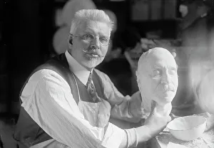 Making Prints: U.S.J. Dunbar with Death Mask of Admiral Dewey