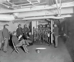 Firearms Prints: U.S.S. Brooklyn, group on gun deck, between 1896 and 1899. Creator: Unknown