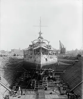 Graving Dock Prints: U.S.S. Massachusetts in dry dock, between 1896 and 1901. Creator: Unknown