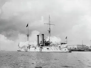 Havana Prints: U.S.S. Montgomery firing last salute to Spanish flag at Havana, ca 1898. Creator: Unknown
